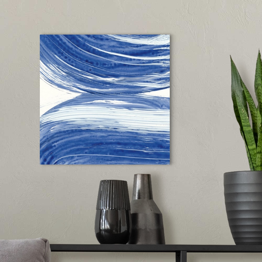 A modern room featuring Large square abstract painting of bold blue brush strokes in curved lines.