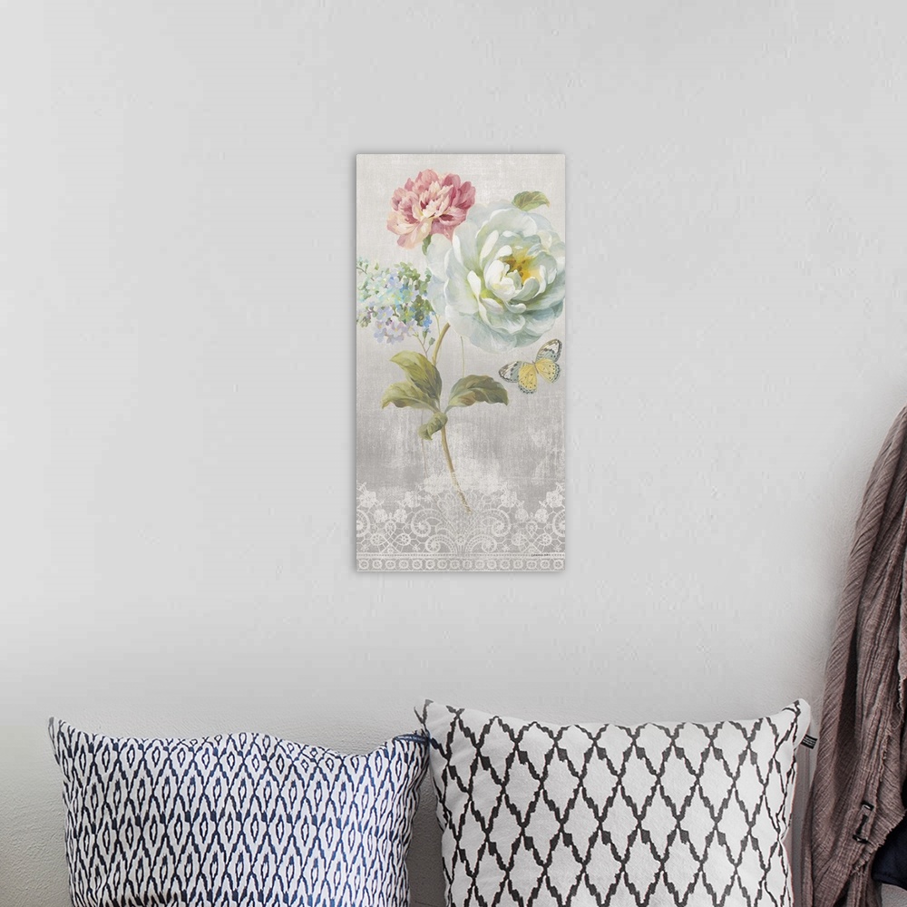 A bohemian room featuring Contemporary artwork of soft flowers against a gray and ornately patterned background.