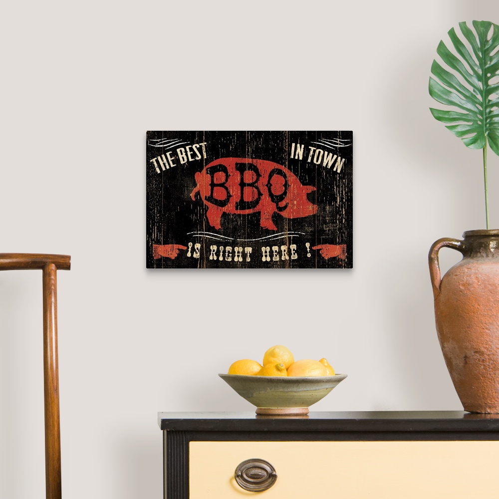 A traditional room featuring Contemporary artwork of an old weathered looking sign, with a red pig silhouette in the center of...