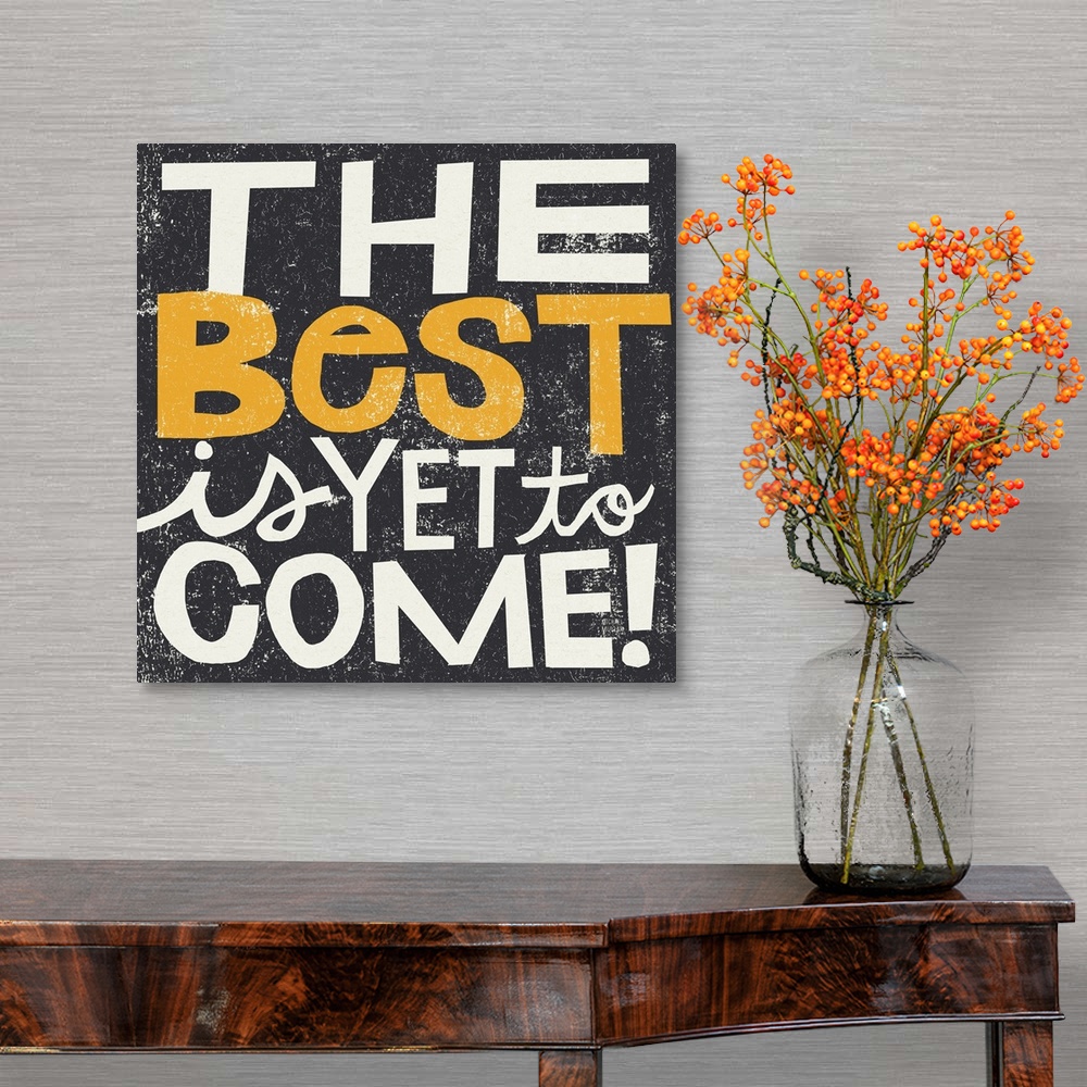 A traditional room featuring Inspirational wall art featuring bright typography with the words the best is yet to come atop a ...
