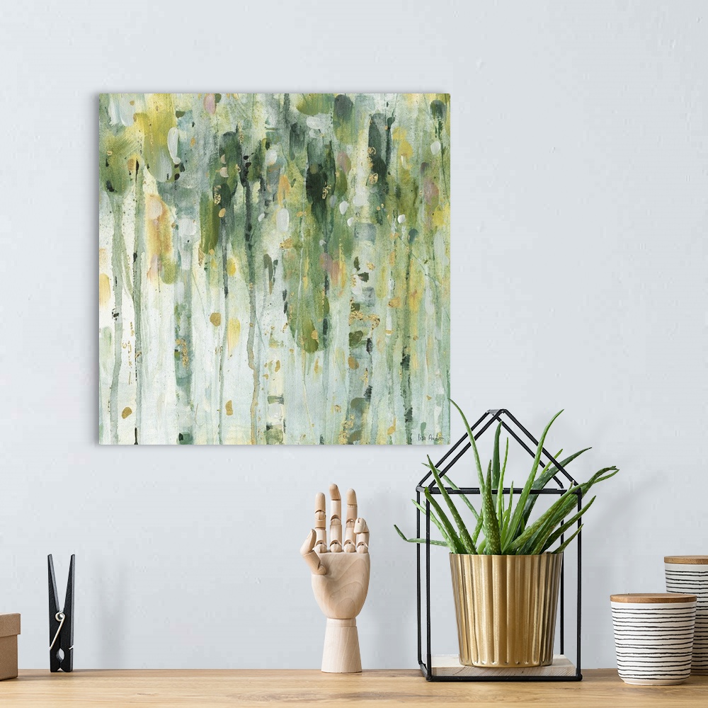 A bohemian room featuring Square contemporary abstract painting with lines of green, blue, yellow, and gold hues running ve...