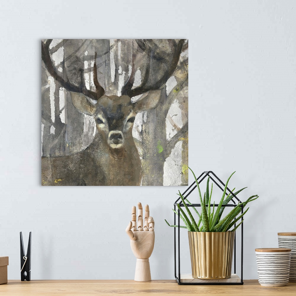 A bohemian room featuring Contemporary artwork of a stag in a forest.