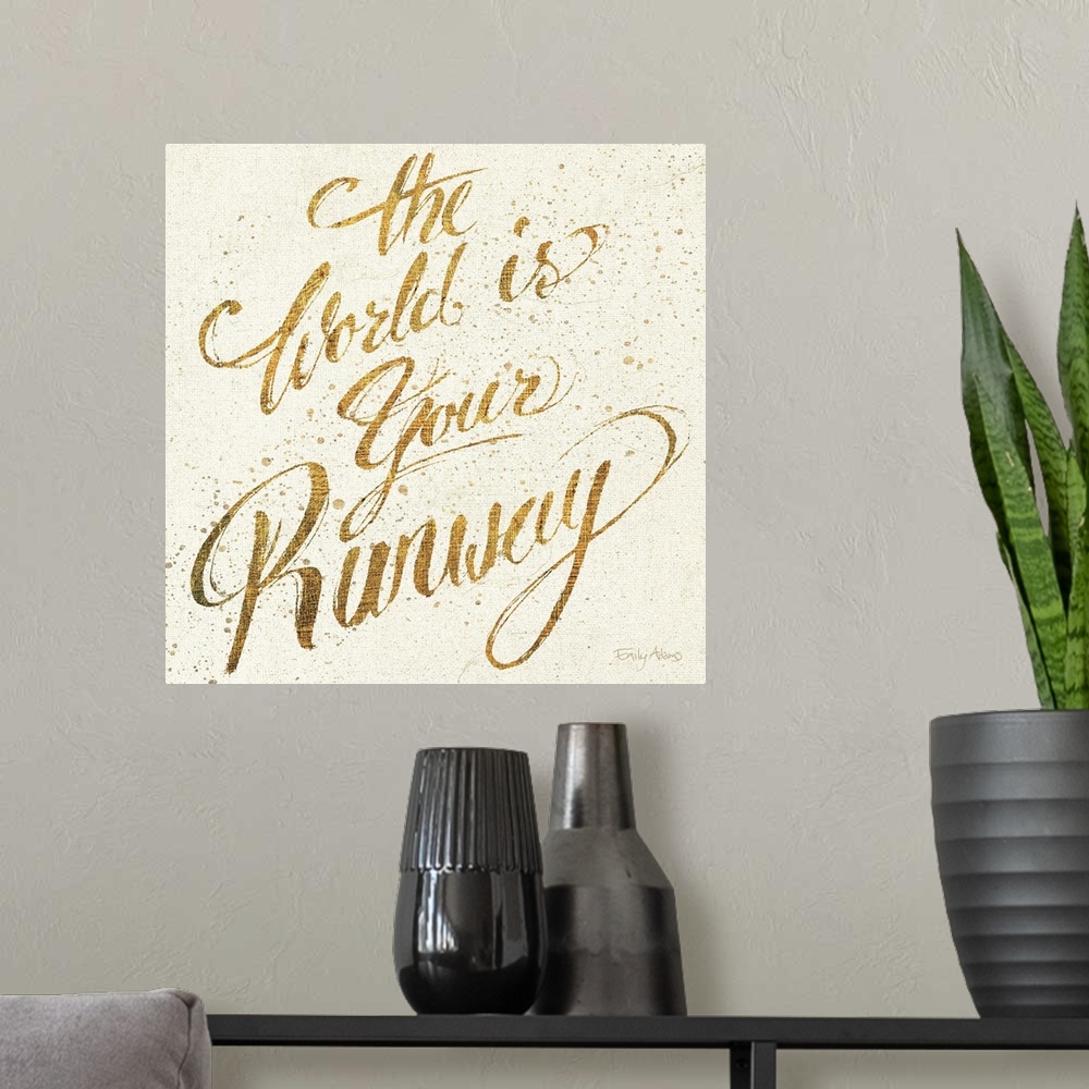 A modern room featuring Handwritten script in gold colors on a textured background.