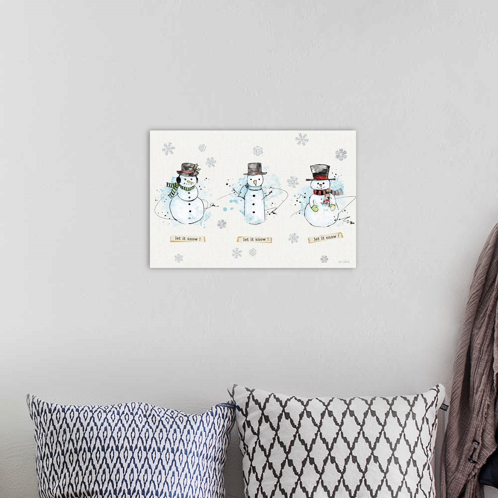 A bohemian room featuring Decorative artwork of snowmen with the text "let it snow! let it snow! let it snow!" and a neutra...