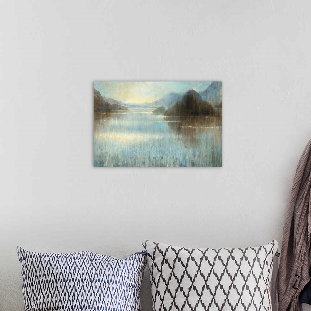 A bohemian room featuring Large abstract painting of a misty lake landscape with large rocks.