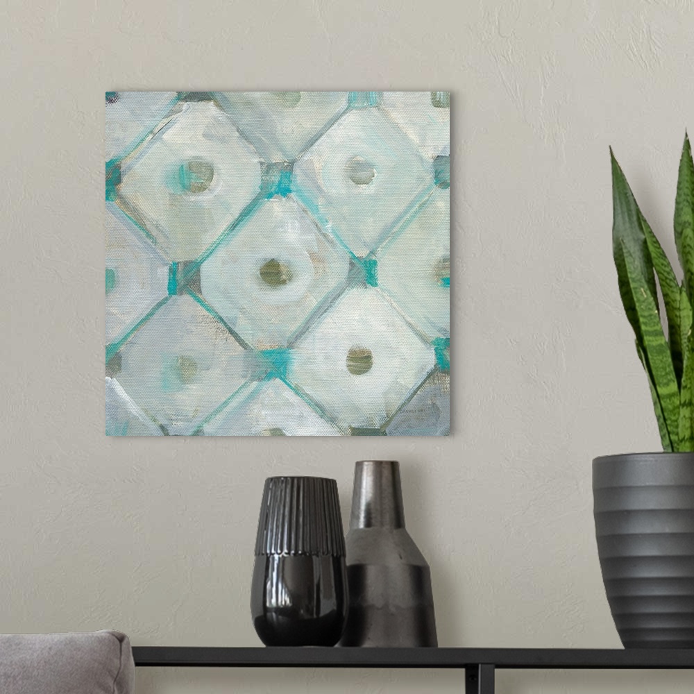 A modern room featuring Square abstract painting of a tiled design made up of squares and circles with gray and teal hues.