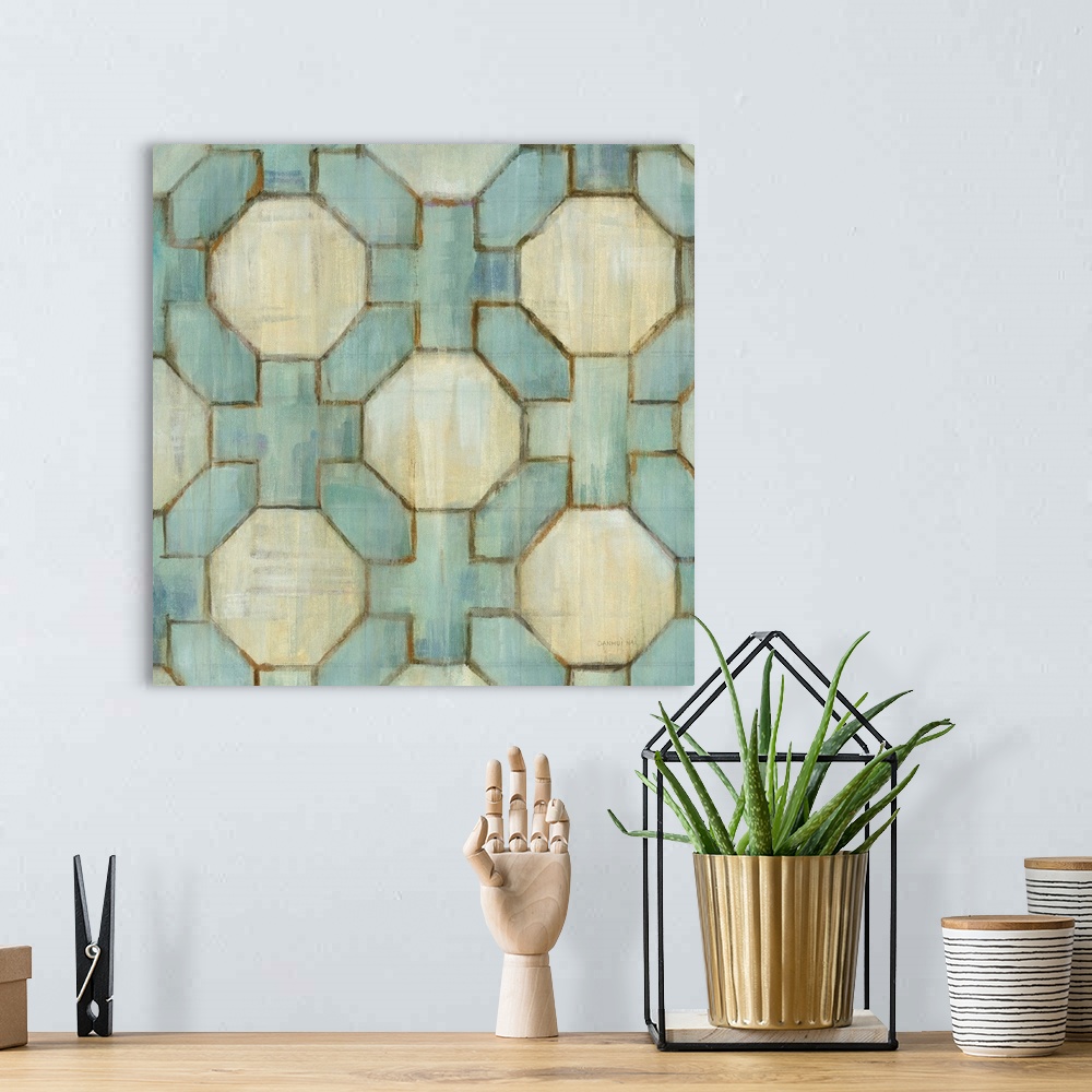 A bohemian room featuring Square abstract painting of a tiled design made up of hexagons and crosses with beige and teal hues.