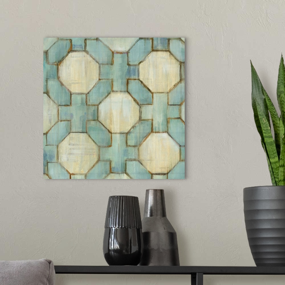 A modern room featuring Square abstract painting of a tiled design made up of hexagons and crosses with beige and teal hues.