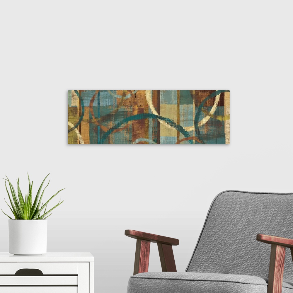 A modern room featuring Abstract painting with circles of different sizes against a background of warm and cool toned ver...
