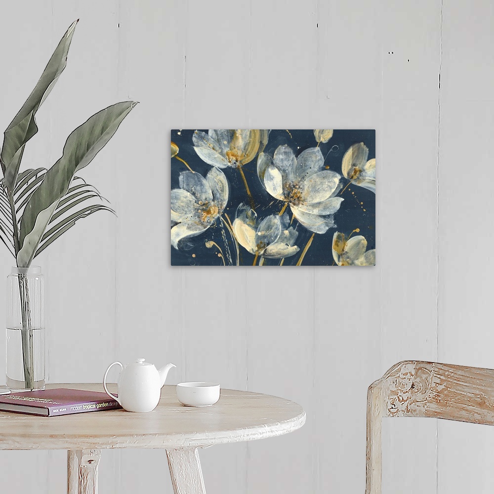 A farmhouse room featuring Large abstract painting of white and gold flowers on a dark blue background.