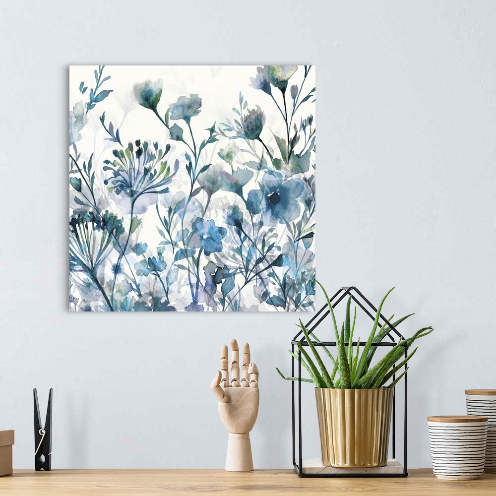 A bohemian room featuring Image of several watercolor flowers in cool blue and green tones.