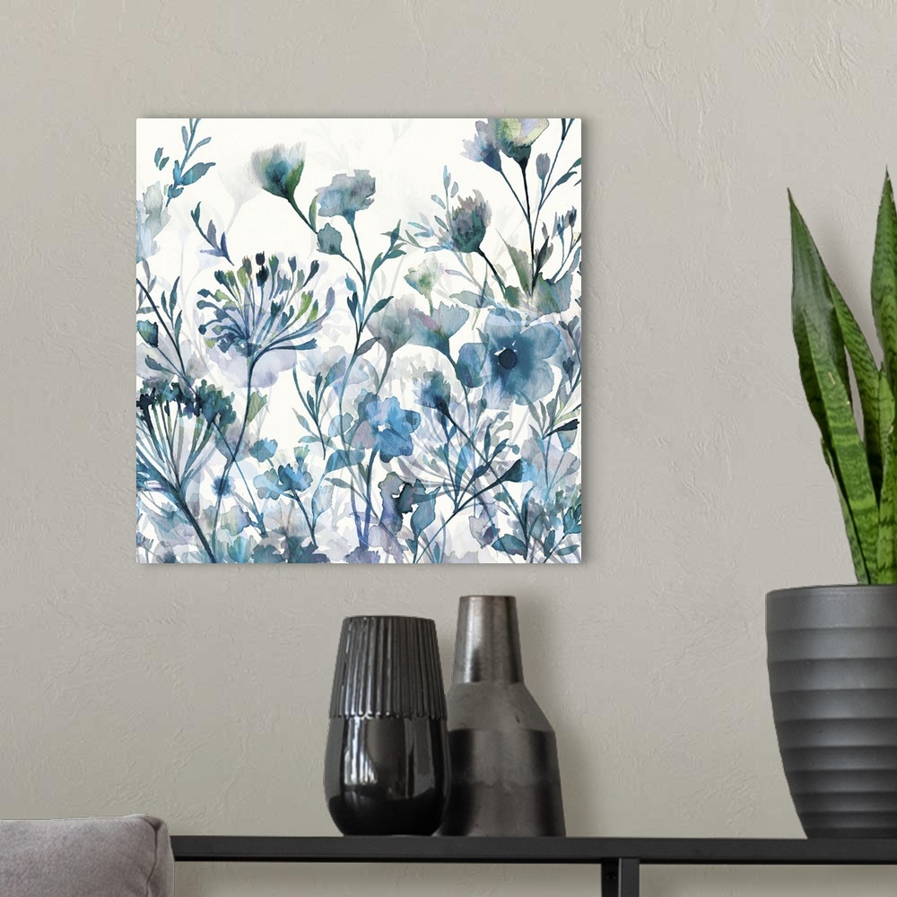 A modern room featuring Image of several watercolor flowers in cool blue and green tones.