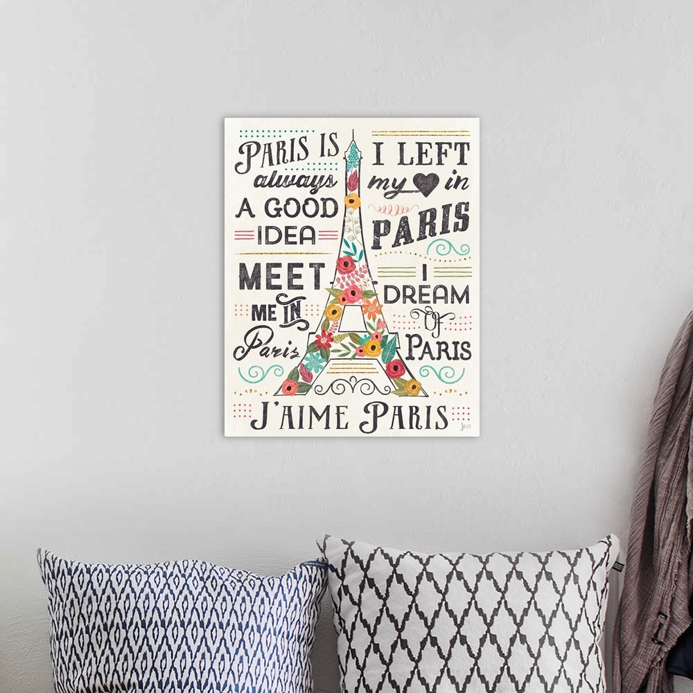 A bohemian room featuring Floral Eiffel Tower illustration with Paris typography surrounding it.