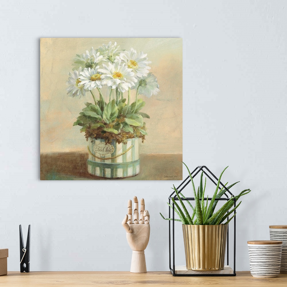 A bohemian room featuring Contemporary painting of white flowers in a planter sitting on a table.
