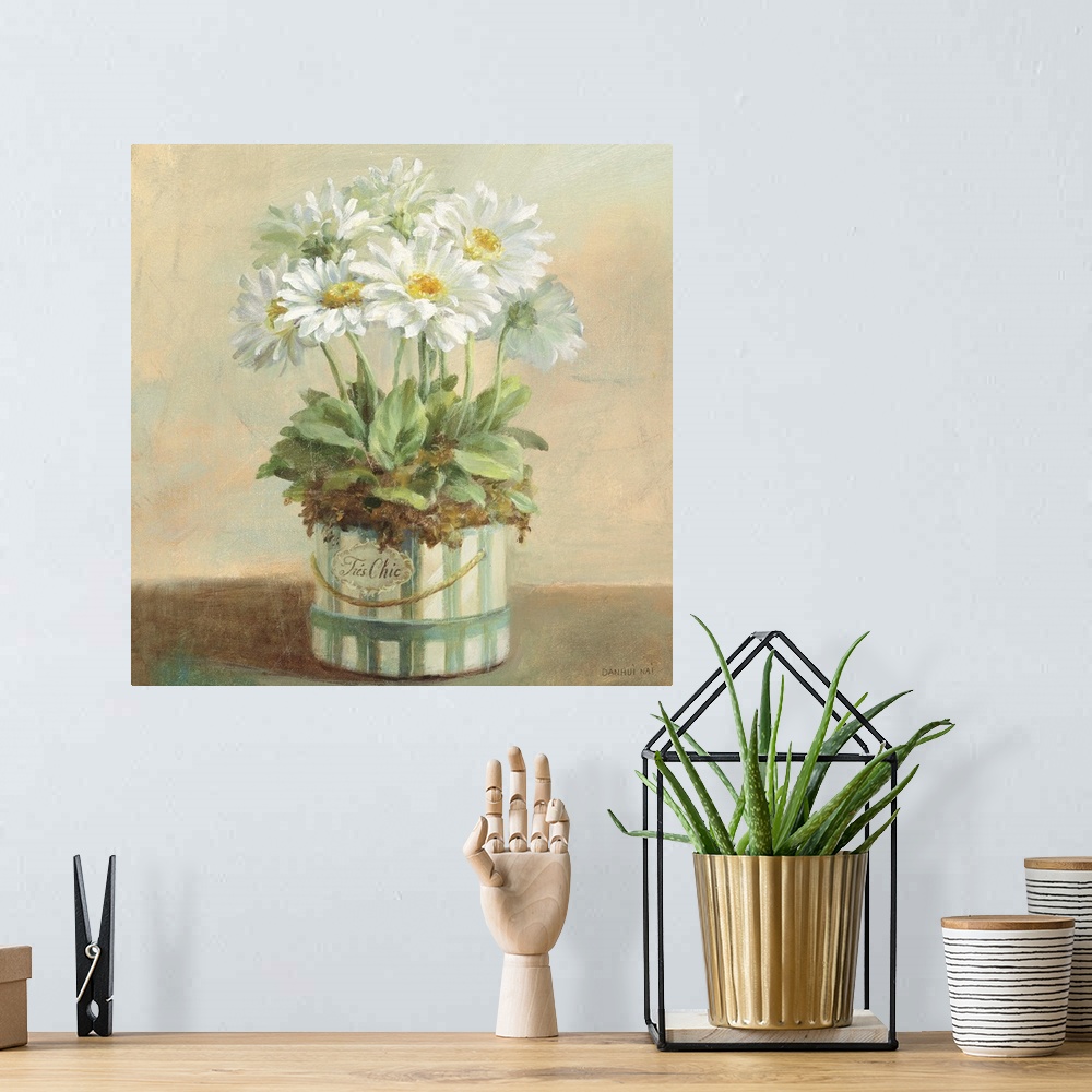A bohemian room featuring Contemporary painting of white flowers in a planter sitting on a table.