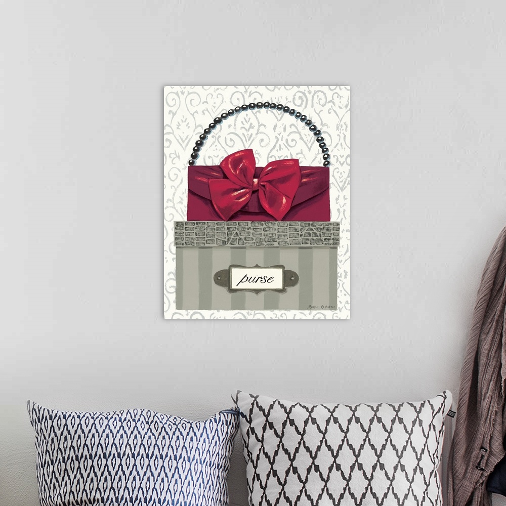 A bohemian room featuring Contemporary artwork of a purse sitting on top of a box.