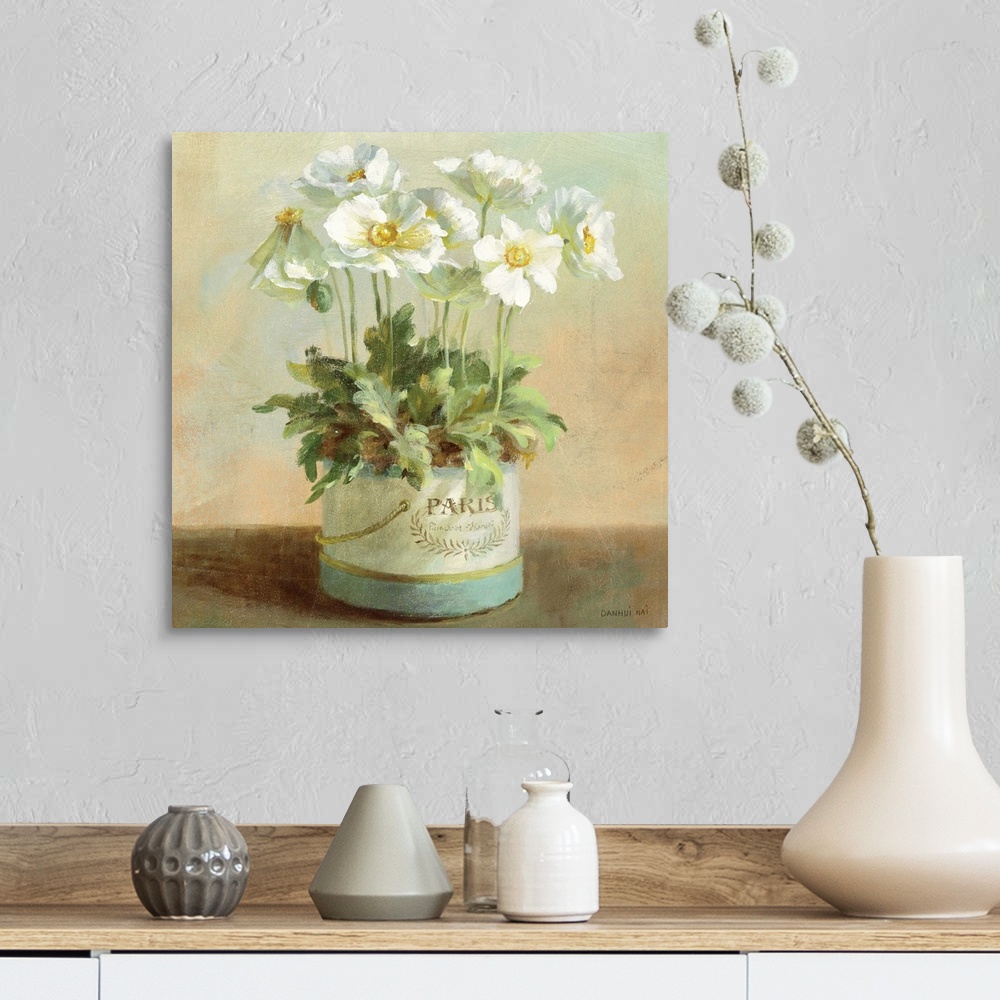 A farmhouse room featuring Contemporary painting of white flowers in a planter sitting on a table.