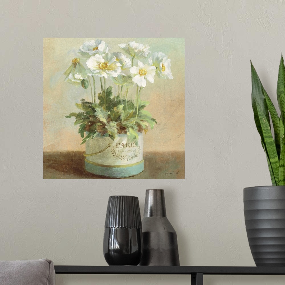 A modern room featuring Contemporary painting of a bouquet of flowers in a planter, sitting on a table.