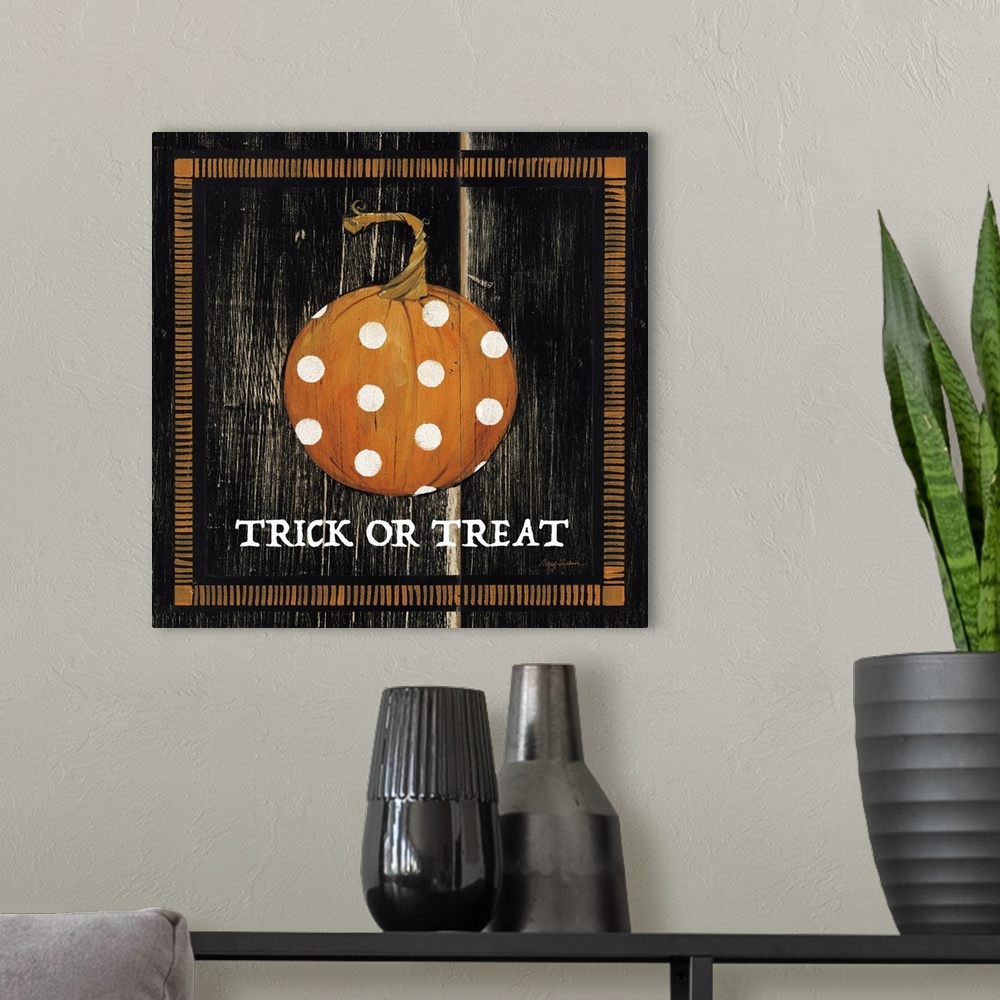 A modern room featuring Trick or Treat Pumpkin