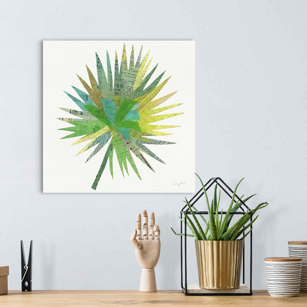 A bohemian room featuring Square decor with a green, blue, and yellow toned palm leaf made out with mixed media.
