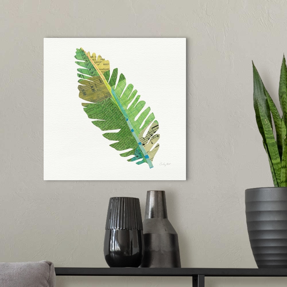 A modern room featuring Square decor with a green, blue, and yellow toned palm leaf made out with mixed media.