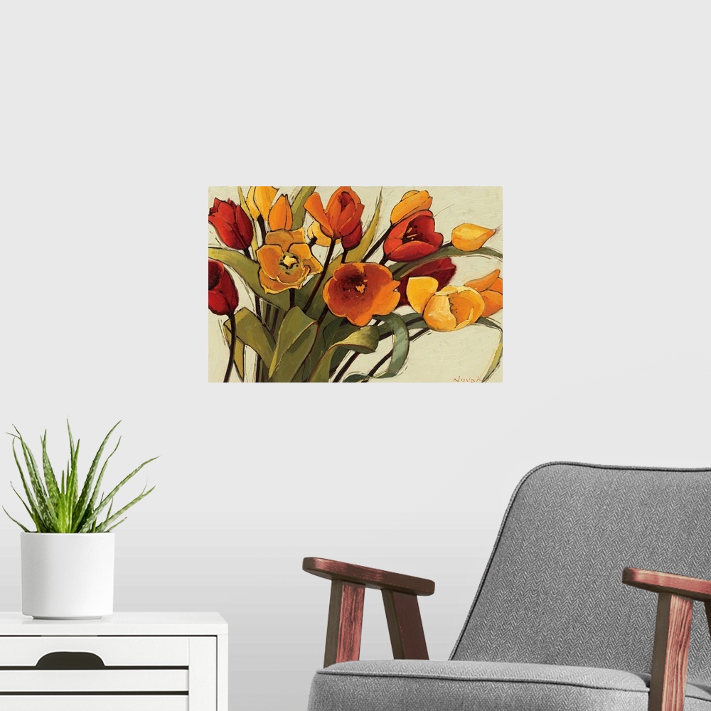 A modern room featuring A horizontal painting that is a close up of a floral arrangement with warm, sunshiny colors.