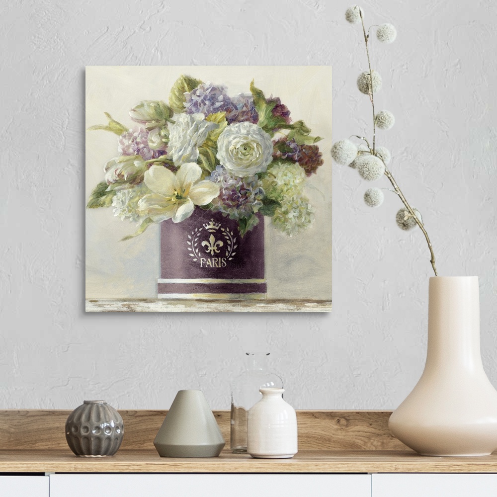 A farmhouse room featuring Still life painting of a hatbox filled with a variety of flowers against a soft background.