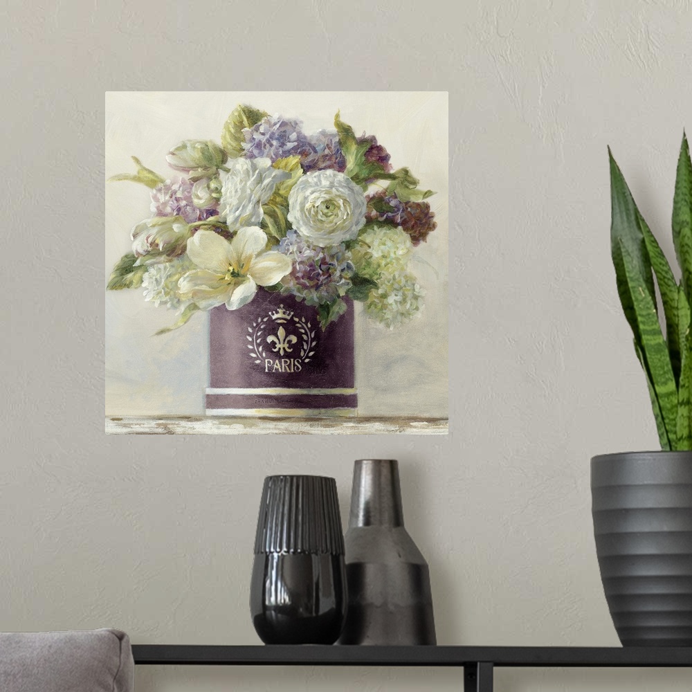A modern room featuring Still life painting of a hatbox filled with a variety of flowers against a soft background.