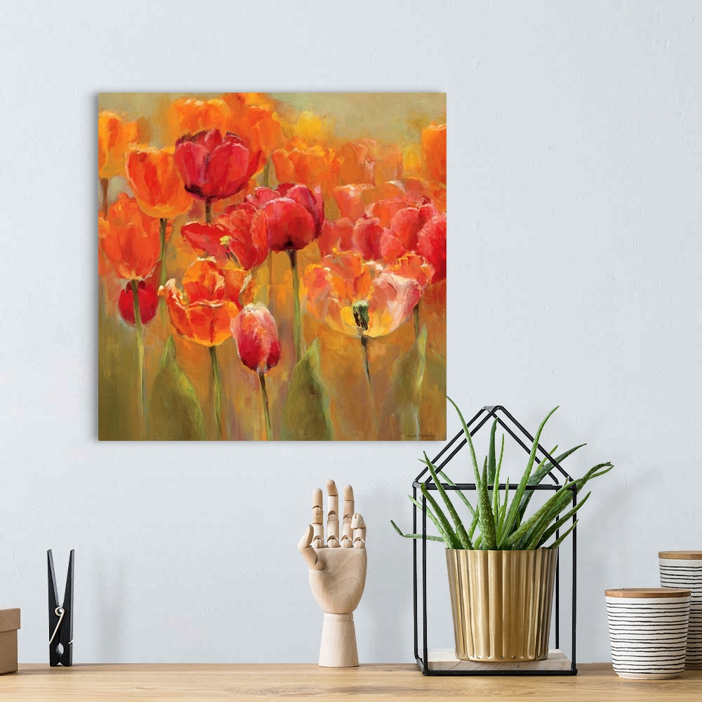 A bohemian room featuring Square painting of tulips with flame colors on a neutral background.