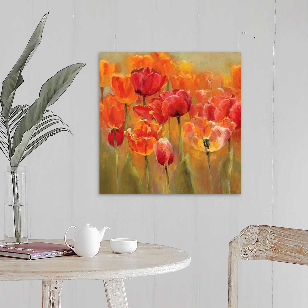 A farmhouse room featuring Square painting of tulips with flame colors on a neutral background.