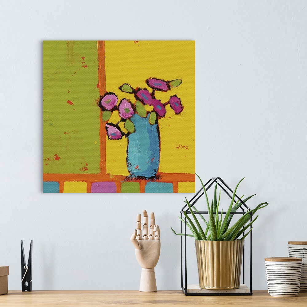 A bohemian room featuring Bright square abstract painting of a turquoise vase filled with pink flowers on a multicolored ba...