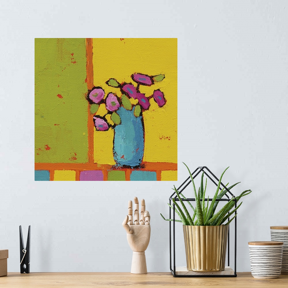 A bohemian room featuring Bright square abstract painting of a turquoise vase filled with pink flowers on a multicolored ba...