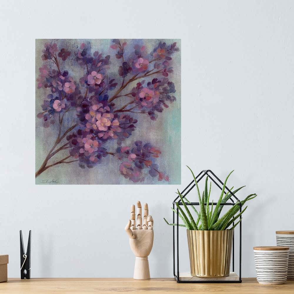 A bohemian room featuring Painting of tree branch filled with small pastel colored flowers.