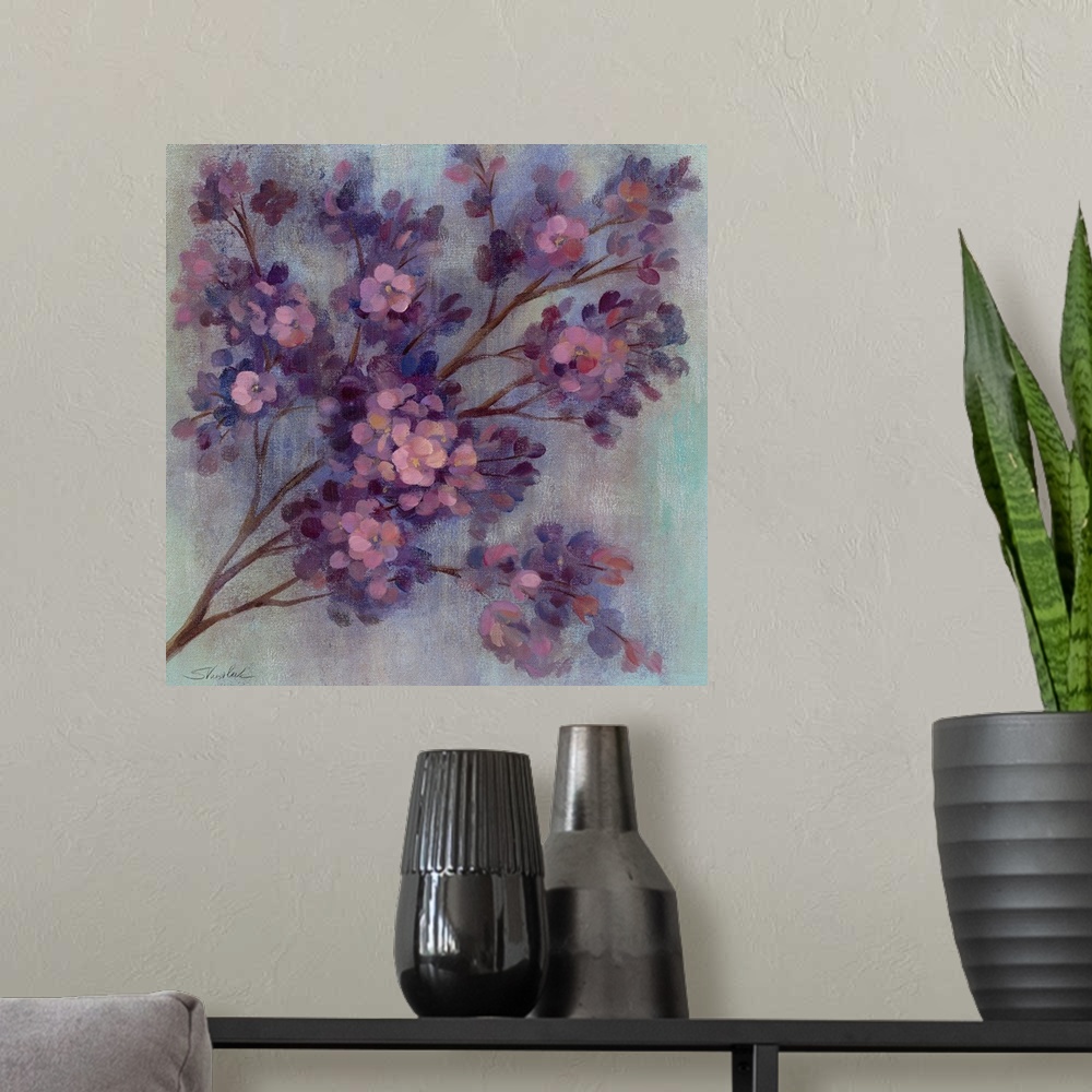 A modern room featuring Painting of tree branch filled with small pastel colored flowers.