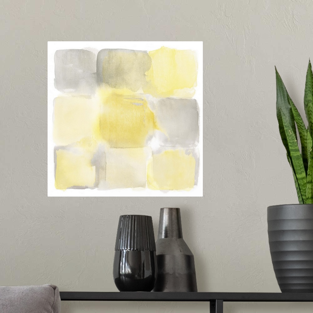 A modern room featuring Simple watercolor painting of yellow and gray square shapes.