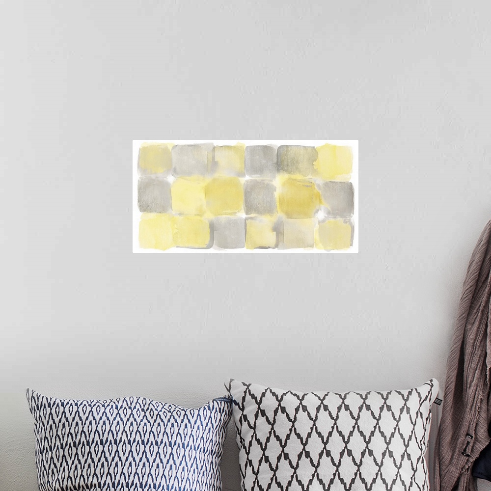 A bohemian room featuring Watercolor abstract painting of yellow and grey squares.