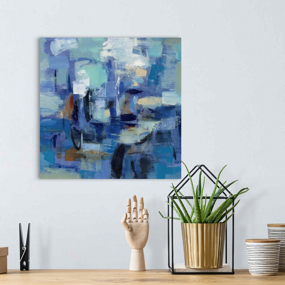 A bohemian room featuring Contemporary abstract painting using a multitude of blue tones and bold textures.