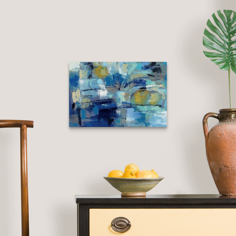 A traditional room featuring Contemporary abstract painting using tones of blue to create depth.