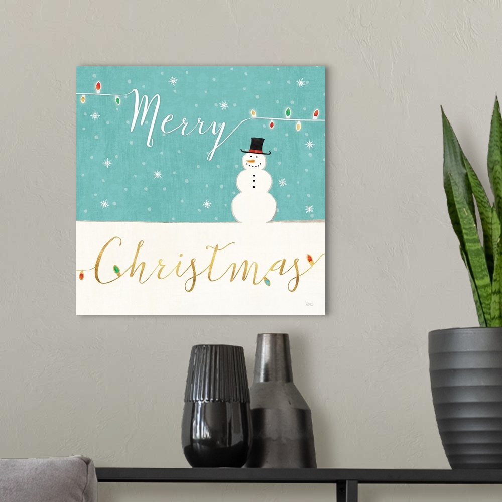 A modern room featuring Square Christmas decor that reads "Merry Christmas" in a snowy scene with a snowman.