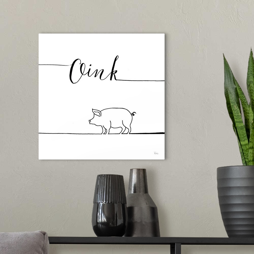 A modern room featuring A simple black and white design of a pig with the text "Oink".