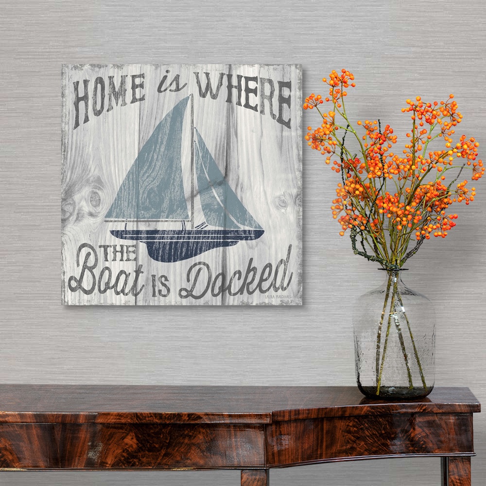 A traditional room featuring "Home is Where the Boat is Docked" in grey with an illustration of a sailboat in shades of blue o...