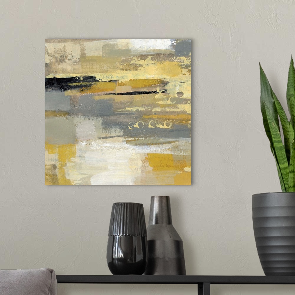 A modern room featuring Abstract contemporary artwork in yellow and grey tones.