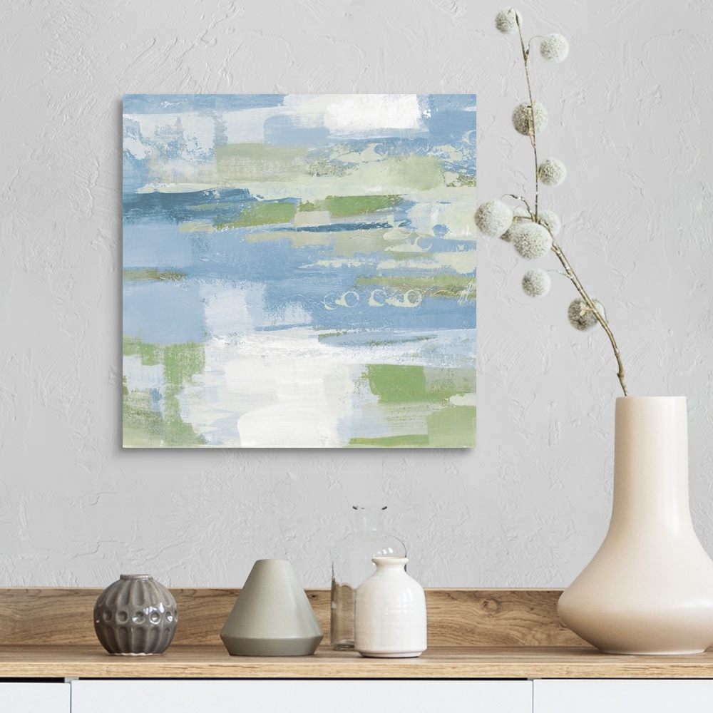 A farmhouse room featuring A square abstract painting of horizontal brush strokes in textured tones of blue, green and white.