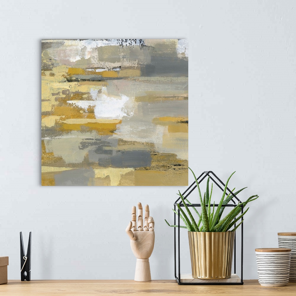 A bohemian room featuring Abstract contemporary artwork in yellow and grey tones.