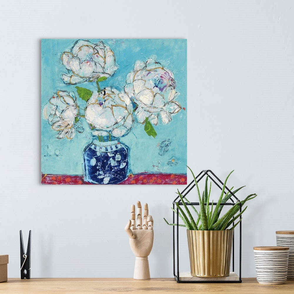 A bohemian room featuring Contemporary artwork featuring white peonies in a vase with heavy textured distressing throughout.