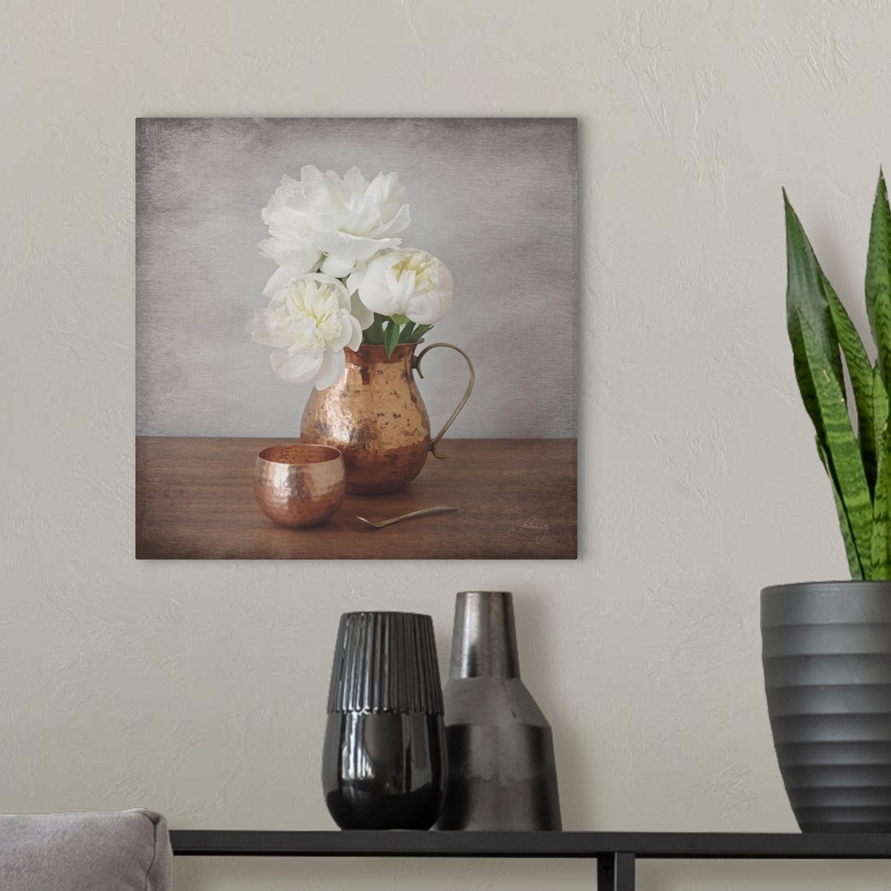 A modern room featuring Still life photograph of a copper vase full of white peonies with a distress overlay.