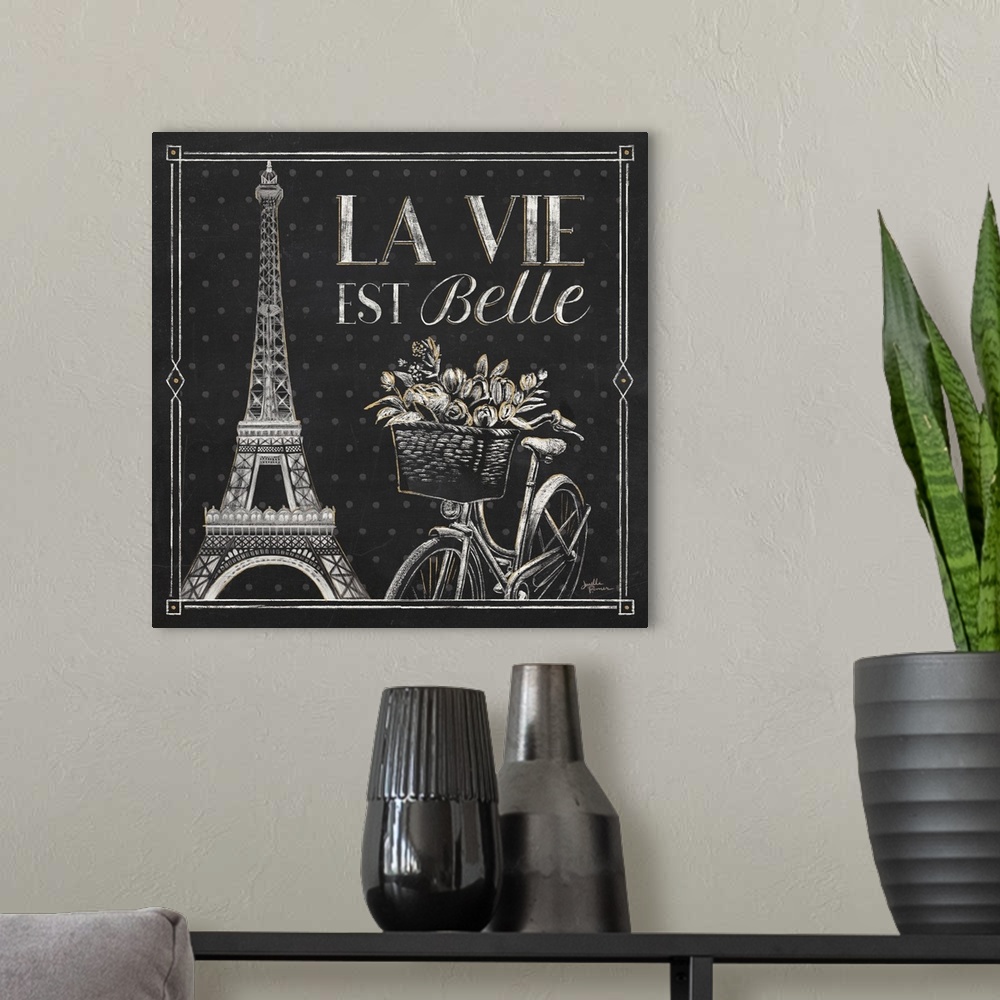 A modern room featuring Square chalkboard sketch with the phrase "La Vie Est Belle" and an illustration of the Eiffel Tow...