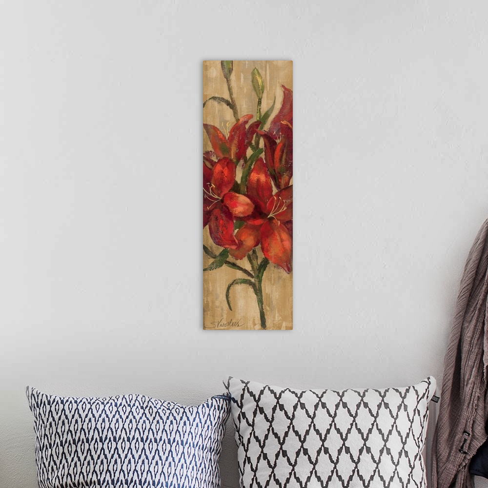 A bohemian room featuring A long vertical piece of artwork perfect for the home of large red lilies on a neutral colored ba...