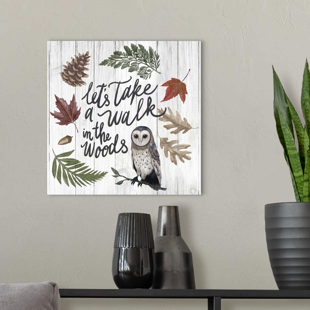 A modern room featuring Handlettered text with painted leaves and a barn owl.