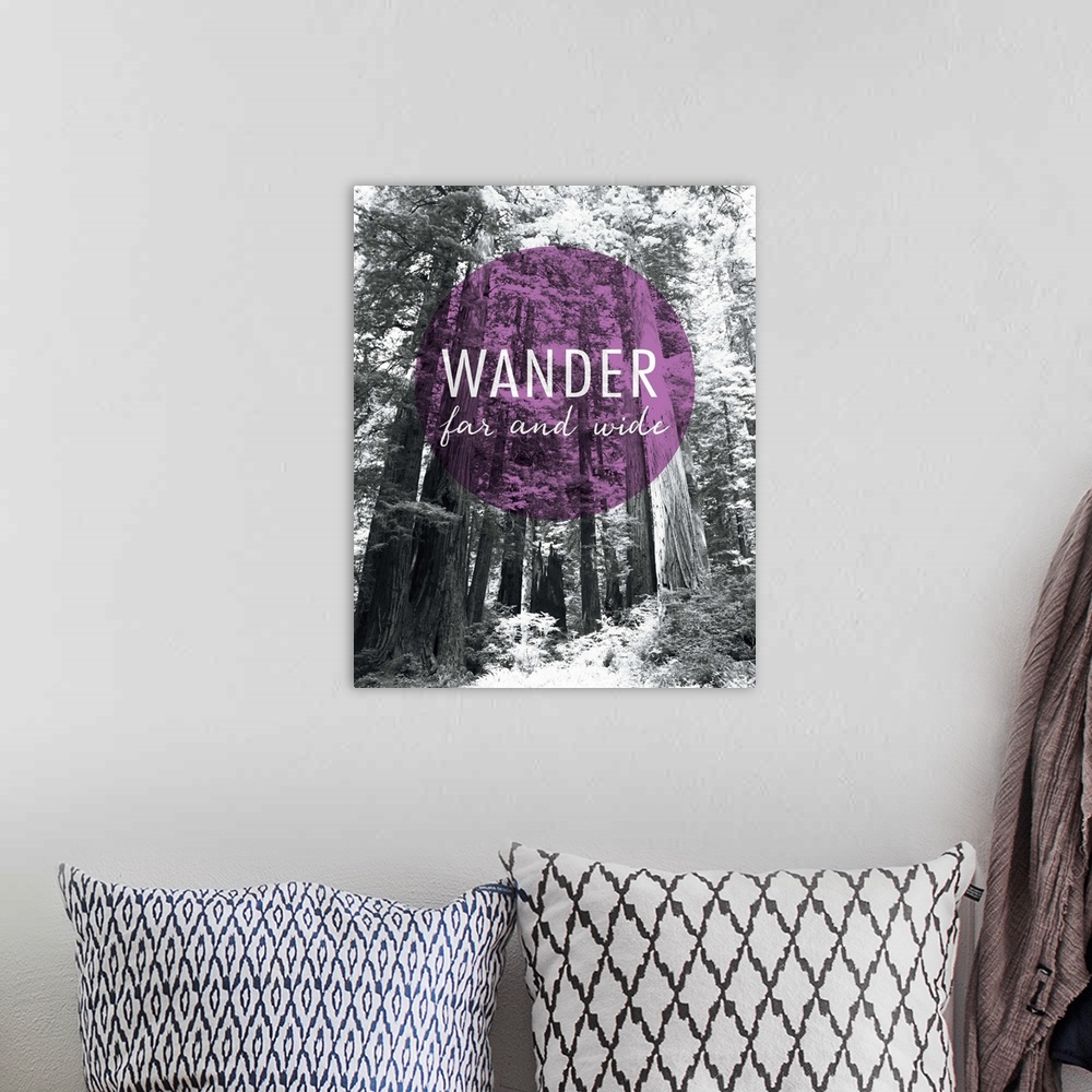 A bohemian room featuring A photography of a forest with an inspirational saying against it.